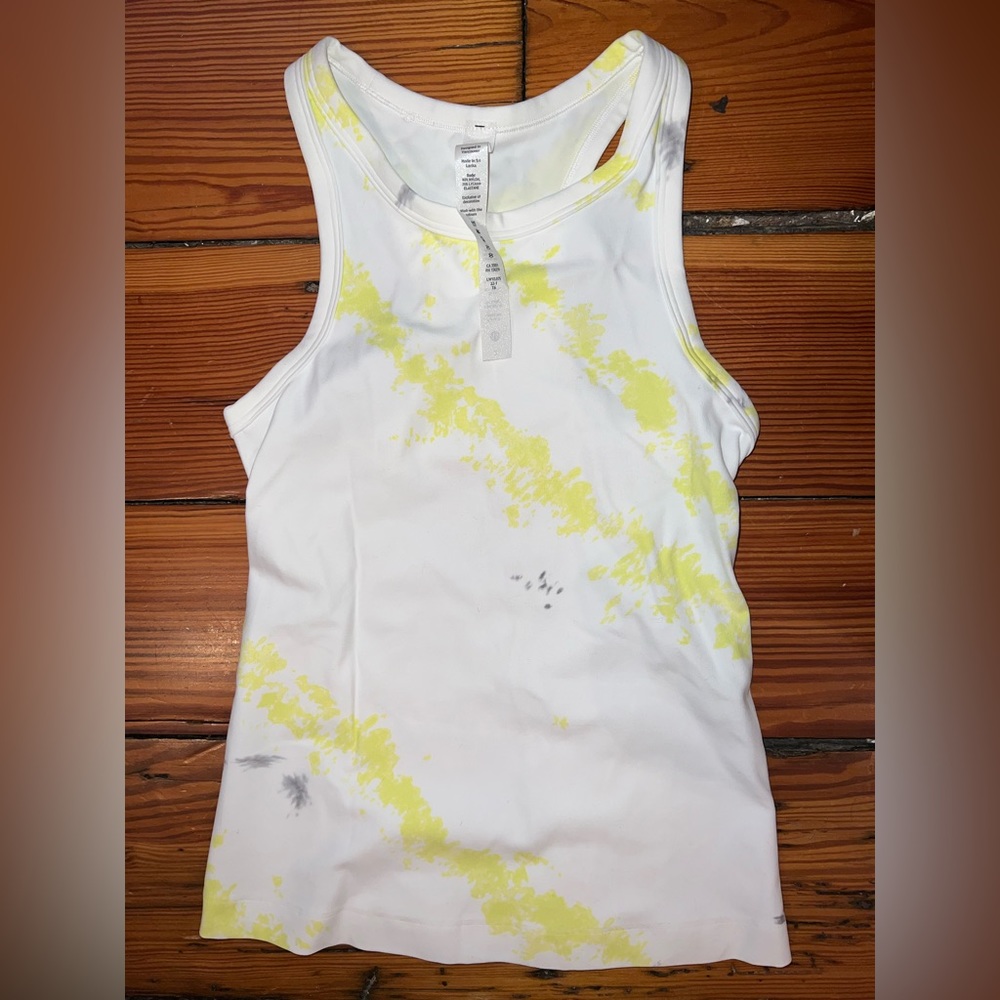 Brand new, with tags -  lulu lemon align waist-length racerback. Size 2.